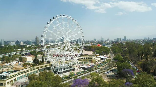 Aerial view orbit Rollercoaster of Aztl&aacute;n urban park landscape view of Chapultepec and Mexico City,