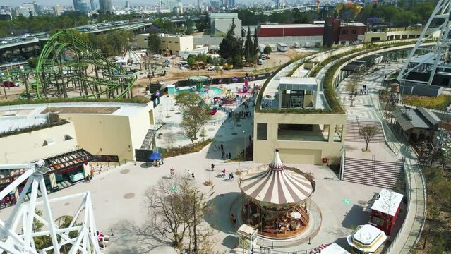 Aerial view approaching the mechanical games in Aztl&aacute;n urban park in Chapultepec, Mexico City.
