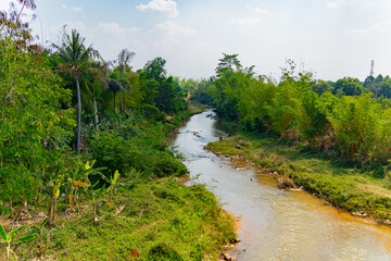 Fototapeta na wymiar A small river. Central highlands of Vietnam.