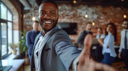 Fototapeta premium new employee being welcomed by businessman to his business team and company with handshake in a modern office with colleagues