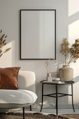 Modern interior design with a blank frame on the wall, grey sofa, and houseplants