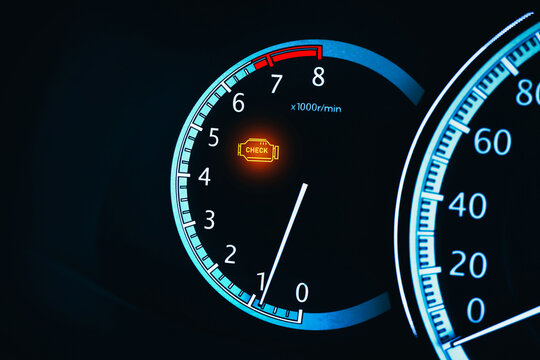 Engine malfunction warning light or Check engine light illuminated on instrument panel in a car , Car repair concept