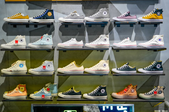 Sneakers All Star Converse of various styles and colors on display in a store. Thailand, Bangkok, 26 February 2024