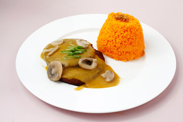 Freshly cooked burger steak served with rice