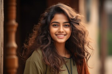 Portrait of a teenager of Indian ethnicity with a smiling face