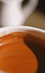 A morning black coffee in the sunlight