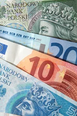 Fototapeten Polish money Zloty's bank notes with Euro's © Richard
