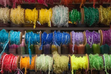 Fototapeten Chiclayo Peru Brightly coloured braiding on the market. © Richard