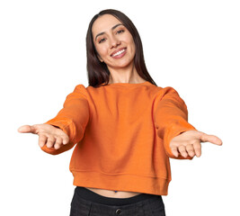 Modern young Caucasian woman portrait on studio background showing a welcome expression.