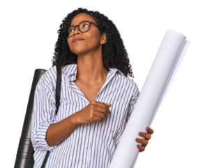 Young African American architect with blueprint dreaming of achieving goals and purposes