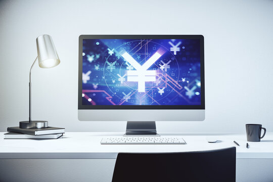 Modern computer monitor with creative Japanese Yen symbol hologram. Banking and investing concept. 3D Rendering