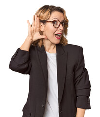 Caucasian woman in black business suit trying to listening a gossip.