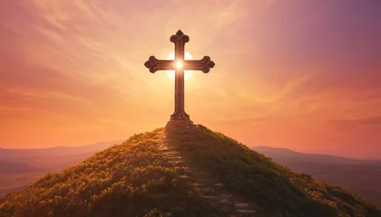 Fotobehang Large Christian cross on a hill against sunset background © Вероника Преображенс