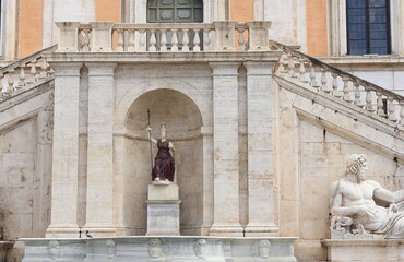 Palazzo Senatorio Exterior Detail with Statue of the Goddess of Rome at Campidoglio Square in Rome, Italy