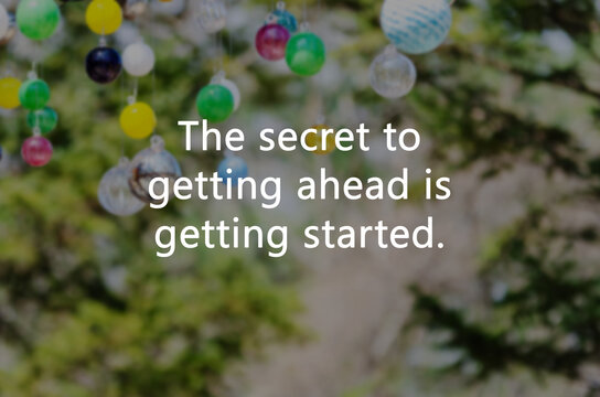 Blurry image with Inspirational quotes the secret of getting ahead is getting started