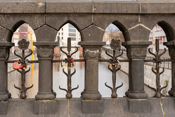 Lovers' locks locked on a bridge. Padlocks of lovers close-up