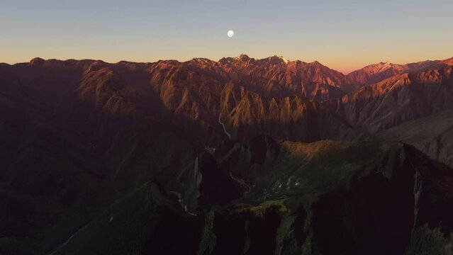 Aerial sunset drone view of Historic Sanctuary of Machu Picchu. Peru