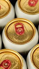 Cold aluminum cans top view. Many cans of beer or other drinks