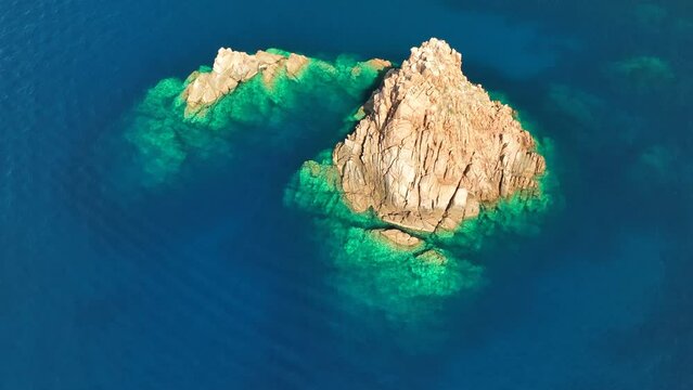 The stunning golf de girolata in corsica with turquoise waters, aerial view