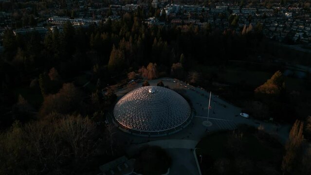 aerial shot revealing bloedel observatory in Queen Elizabeth Park and Vancouver city at sunset, british columbia, canada