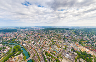 Fototapeta na wymiar Zurich, Switzerland. Panorama of the city in cloudy weather. Summer day. Aerial view