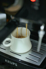 Steaming Cup of Coffee on a Stove