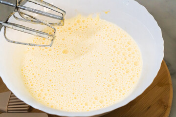 Mixed liquid for making a cake. Mixed liquid for making a cake, eggs, sugar and milk.