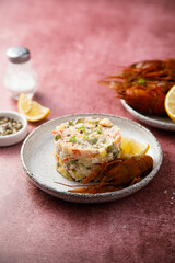 Traditional Russian salad with crawfish
