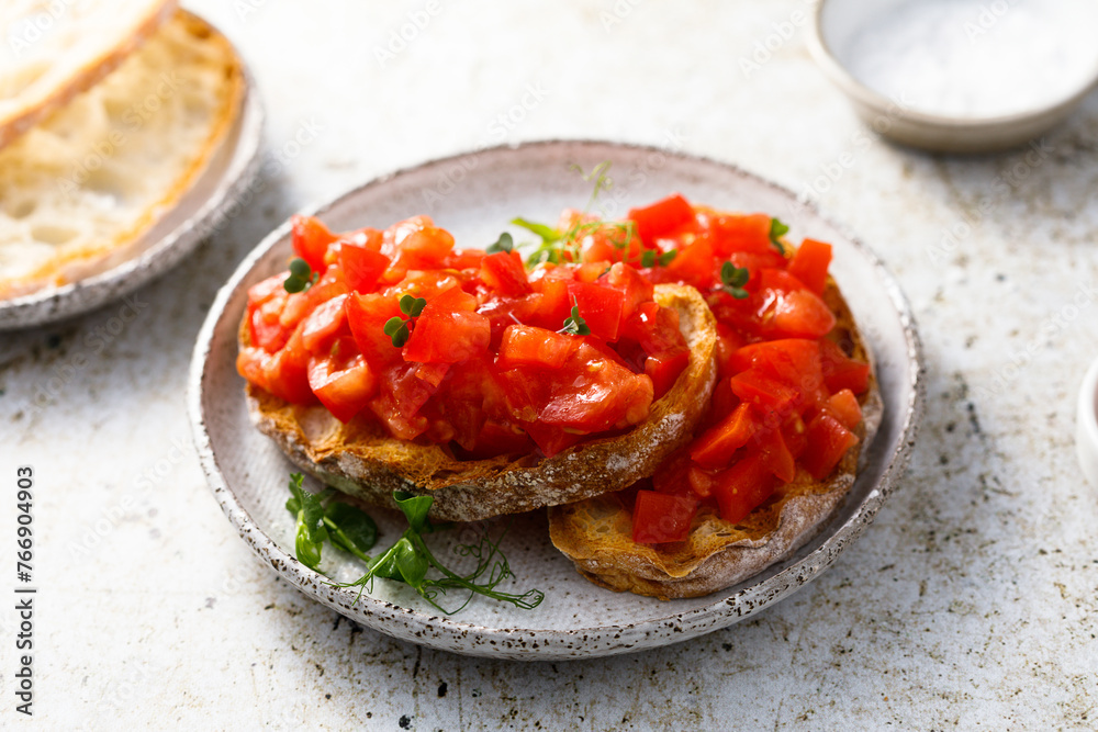 Poster traditional tomato bruschetta with greens