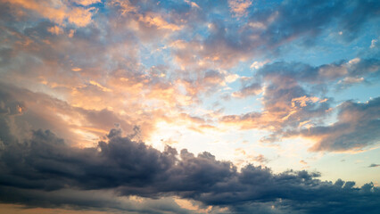 Sunset Clouds background. Dramatic Clouds Sunset Background. Sky with clouds in Sunrise. Sunrise with clouds in various shapes background. Calm Cloud.