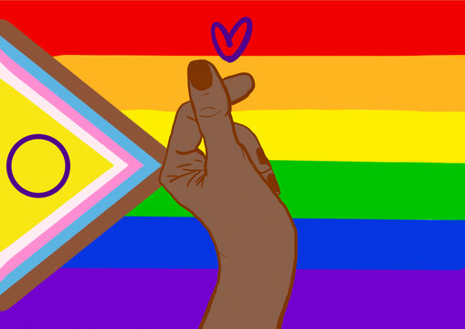 Hand of woman making heart shape against rainbow flag