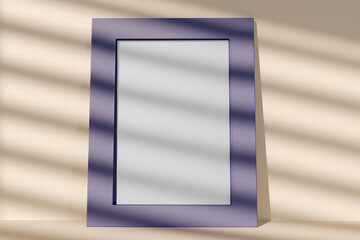 Mock up frame with shadows. modern purple frame stands on light wall background, casting soft...