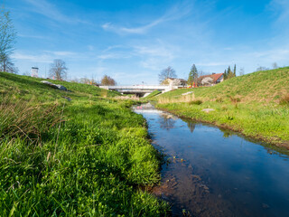 Pfaffenhofen Bürger Park with the Ilm as a little creek and blue sky background