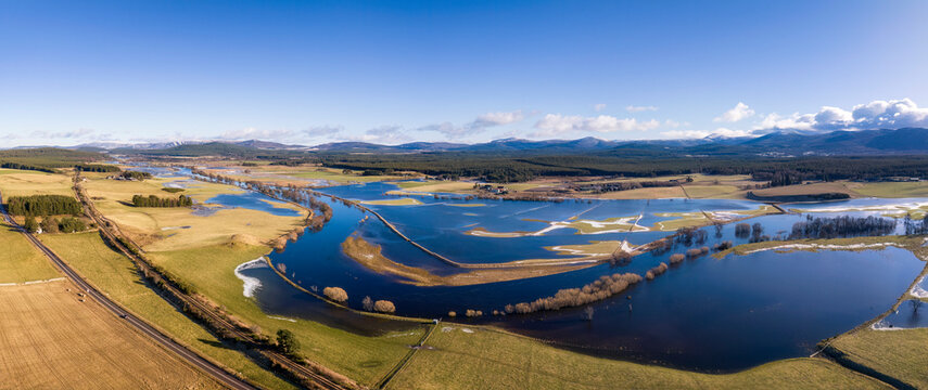 UK, Scotland, Boat of Garten, Aerial panorama of river Spey in flood