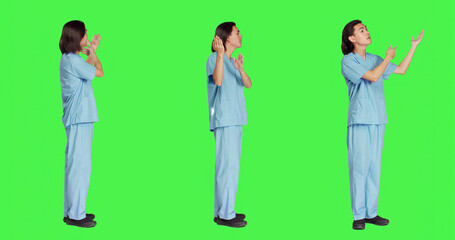 Asian medical assistant creates commercial for new medical ad campaign against greenscreen...
