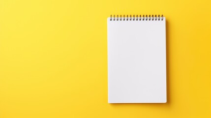 A clean notebook for writing on a colored background, the concept of education, workplace, creativity. A place for text or advertising.