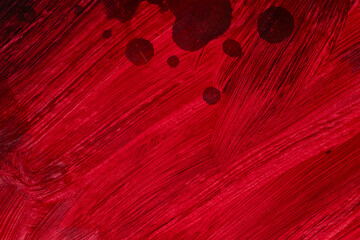 赤色の絵具で塗られた背景