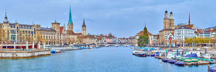 Zurich's iconic panorama showcases the Grossmünster and Fraumünster churches overlooking the...