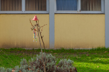 abstract decoration on a shrub in the garden