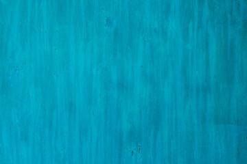 rough turquoise matte paint on flat sheet metal surface - full-frame background and texture.