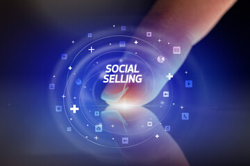 Finger touching tablet with social media icons concept