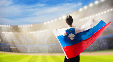 Slovenia football team supporter on stadium.