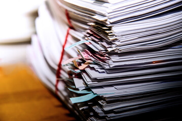 Stack of documents on the table - obrazy, fototapety, plakaty