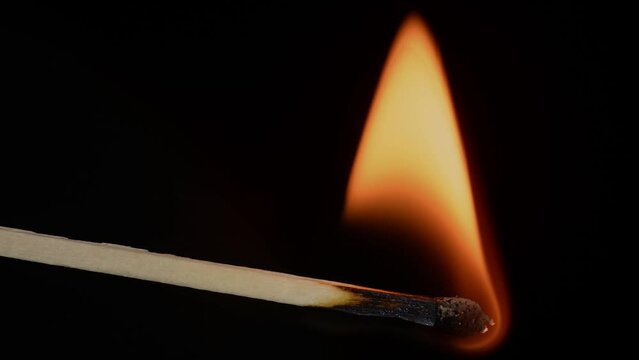 ignition and burning of a match macro shot