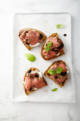 Roast beef on toast with cream cheese and balsamic
