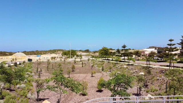 Catalina Beach Park in Perth's northern suburbs, aerial reverse shot looking towards Mindarie Beach