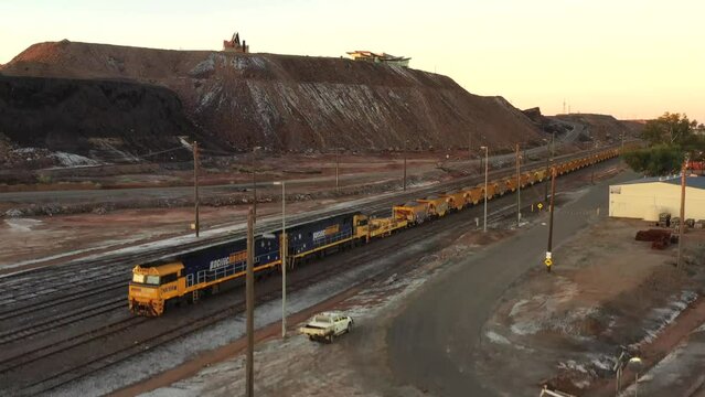 Freight train at Broken Hill railway station in mining town of Australia &ndash; aerial 4k.
