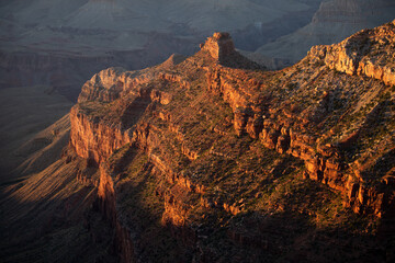 Grand Canyon north rim at golden sunset. Rock canyon, rocky mountains. Scenic view of Grand Canyon. Overlook panoramic view National Park in Arizona. Valley view at dusk.