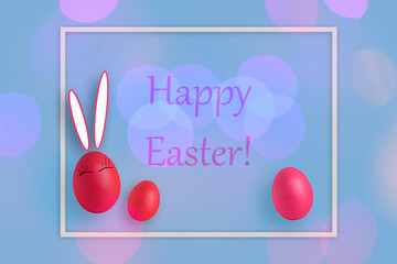 Composition in frame with Easter eggs and on pink background