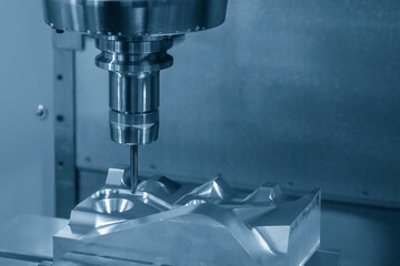 The mold and die manufacturing concepts by CNC milling machine.